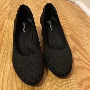 Selling VIVAIA eco-friendly shoes made out of plastic bottles.